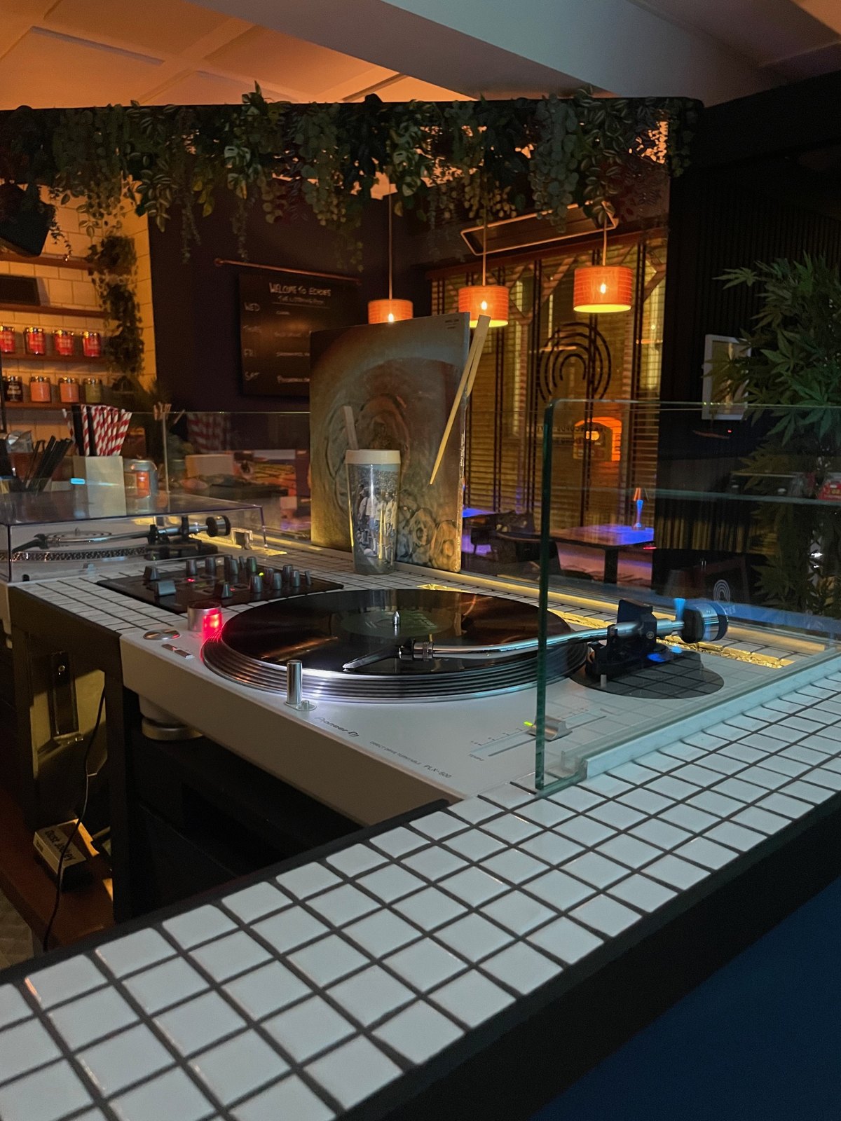 The turntable and mixer behind the counter at Echoes